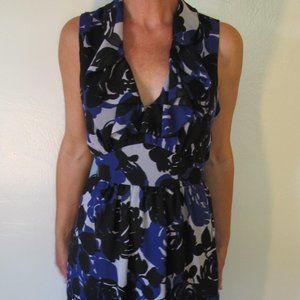 Tulli sleeveless ruffled v neck sundress.